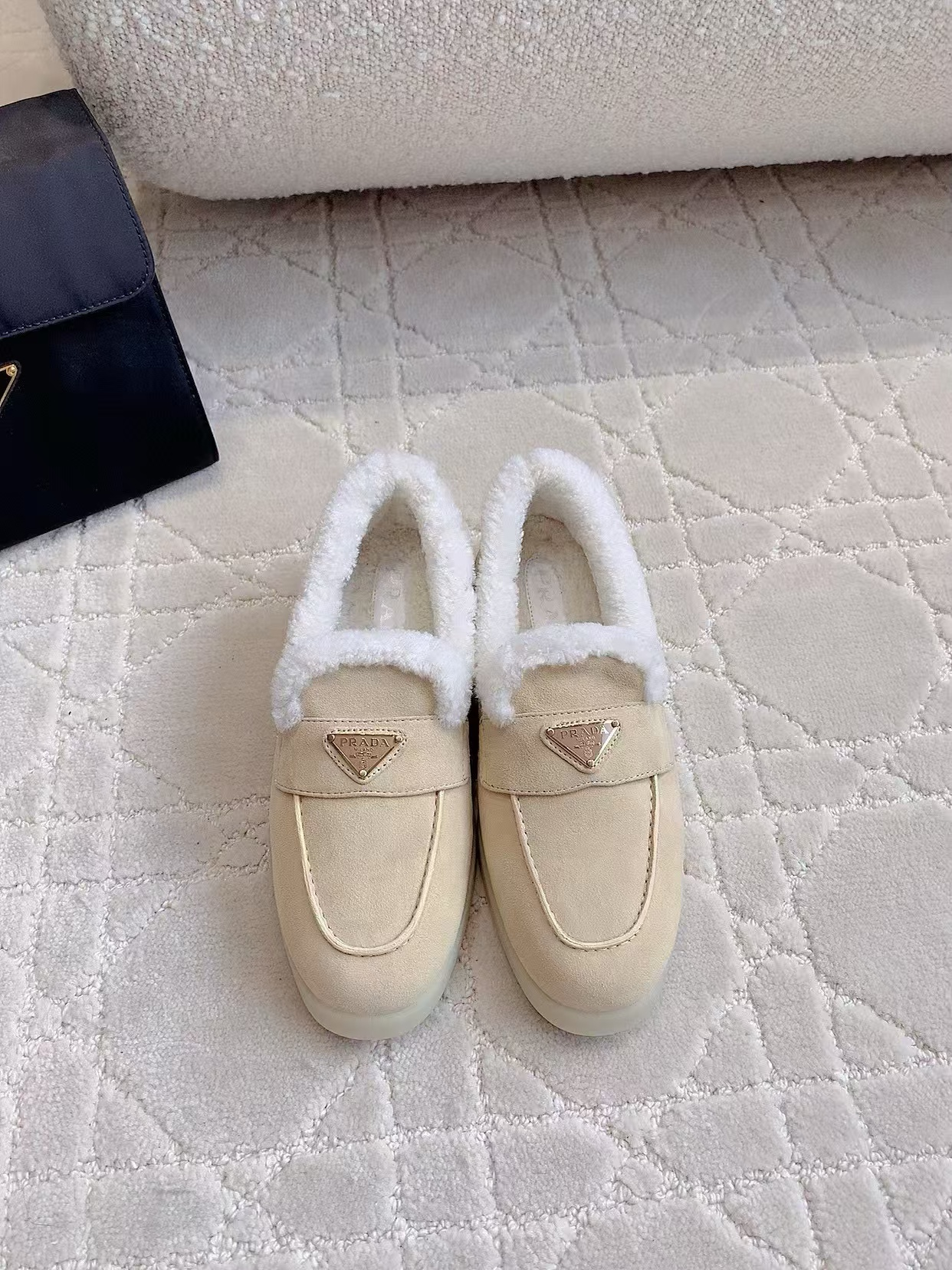 ua Pra*a suede slides