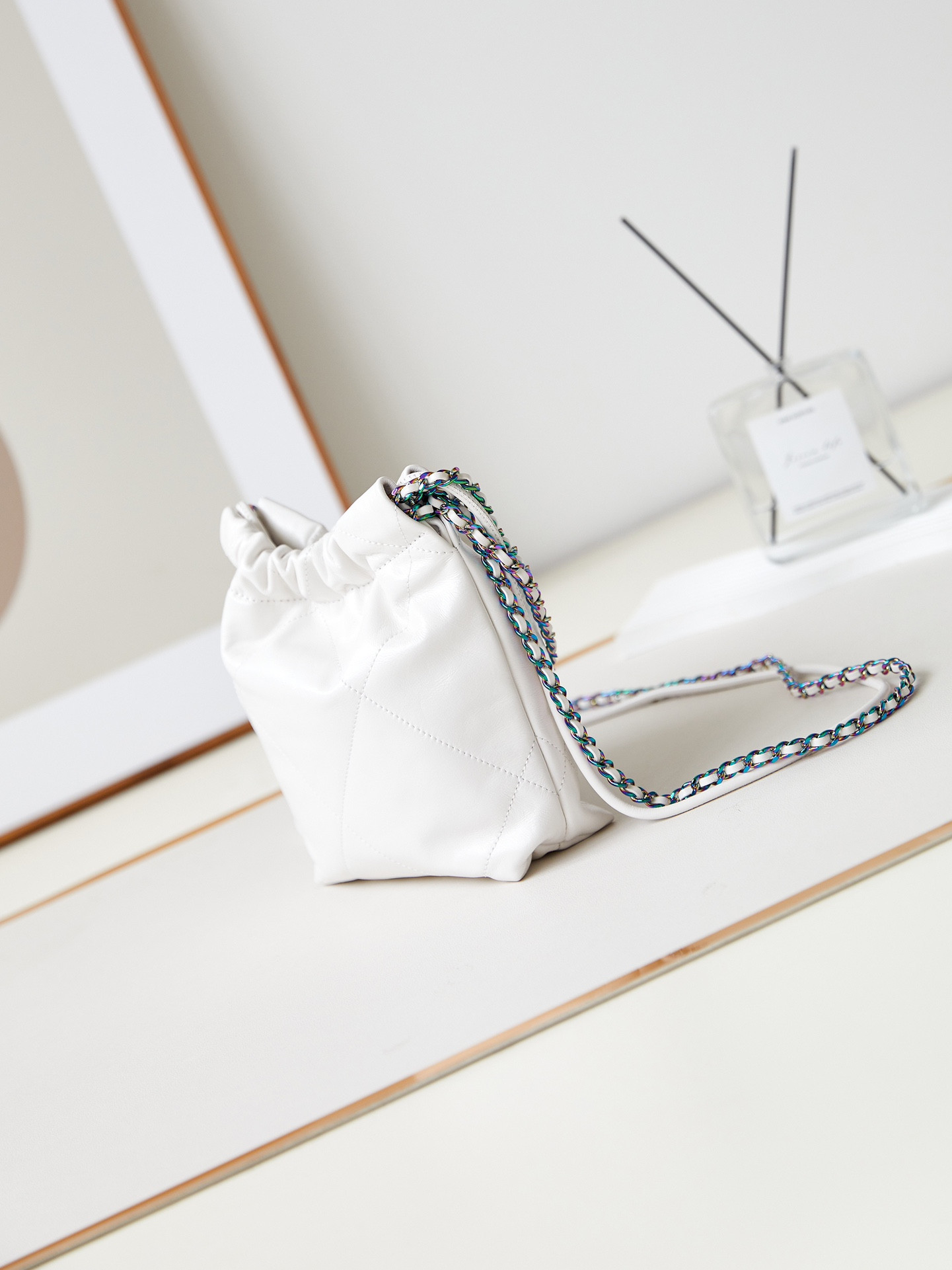 Ch*el 22 mini handbag shiny calfskin & rainbow metal white 7.8 × 7.4 × 2.3 in