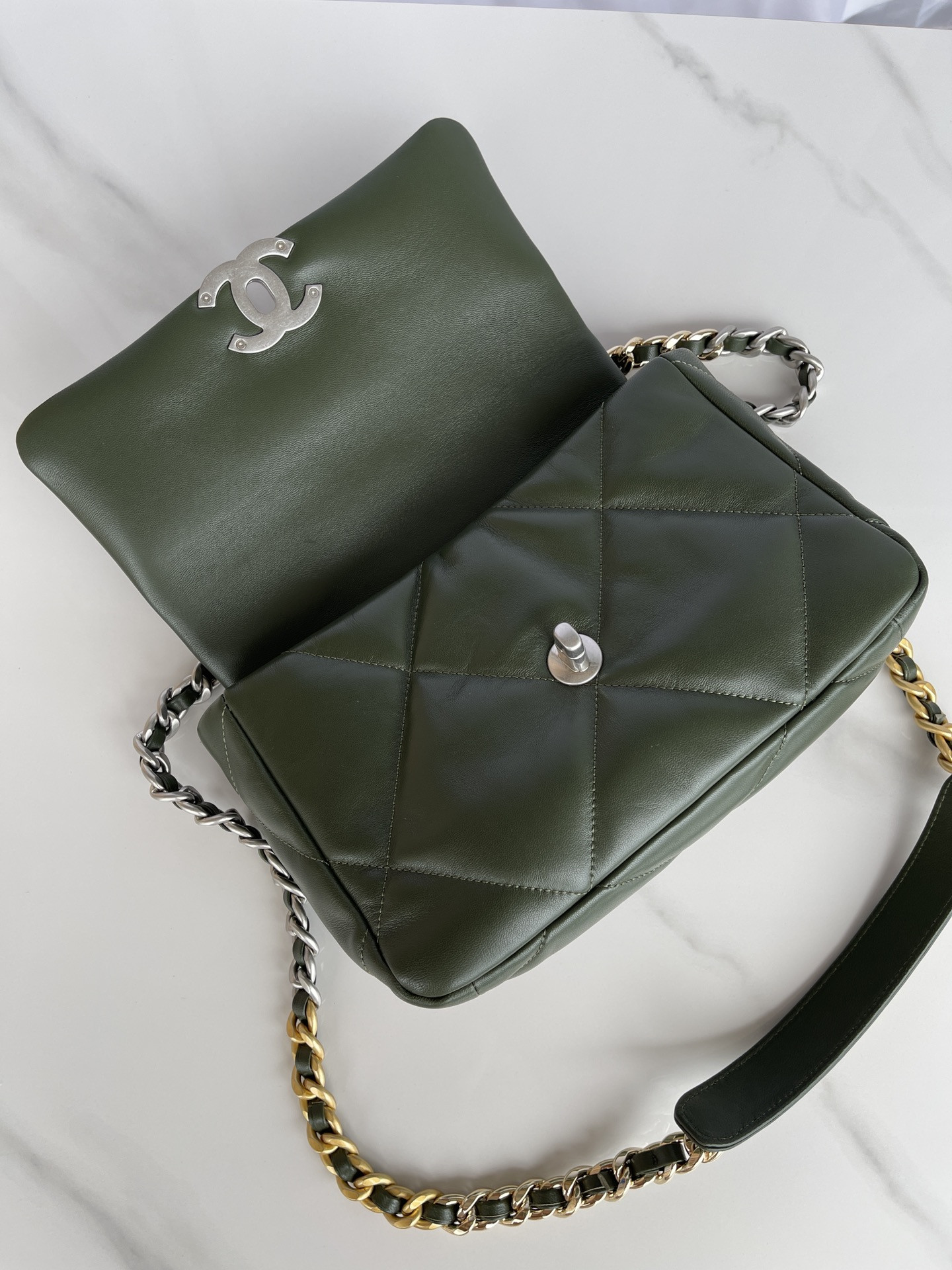 Ch*el 19 handbag shiny leather, gold-tone, silver-tone & ruthenium-finish metal dark green 6.2 × 10.1 × 3.5 in