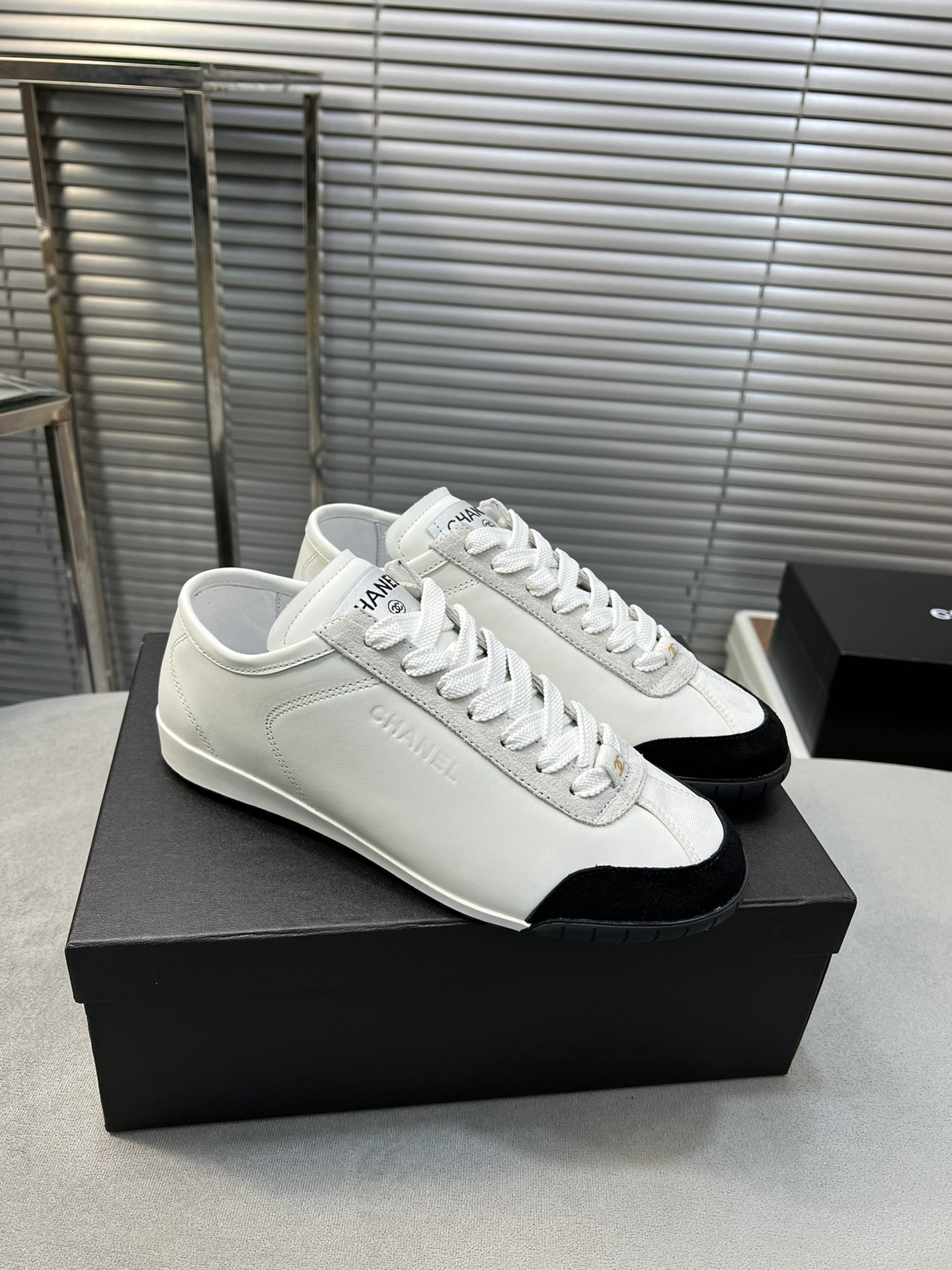 ua Ch*el sneakers calfskin & suede calfskin white & black