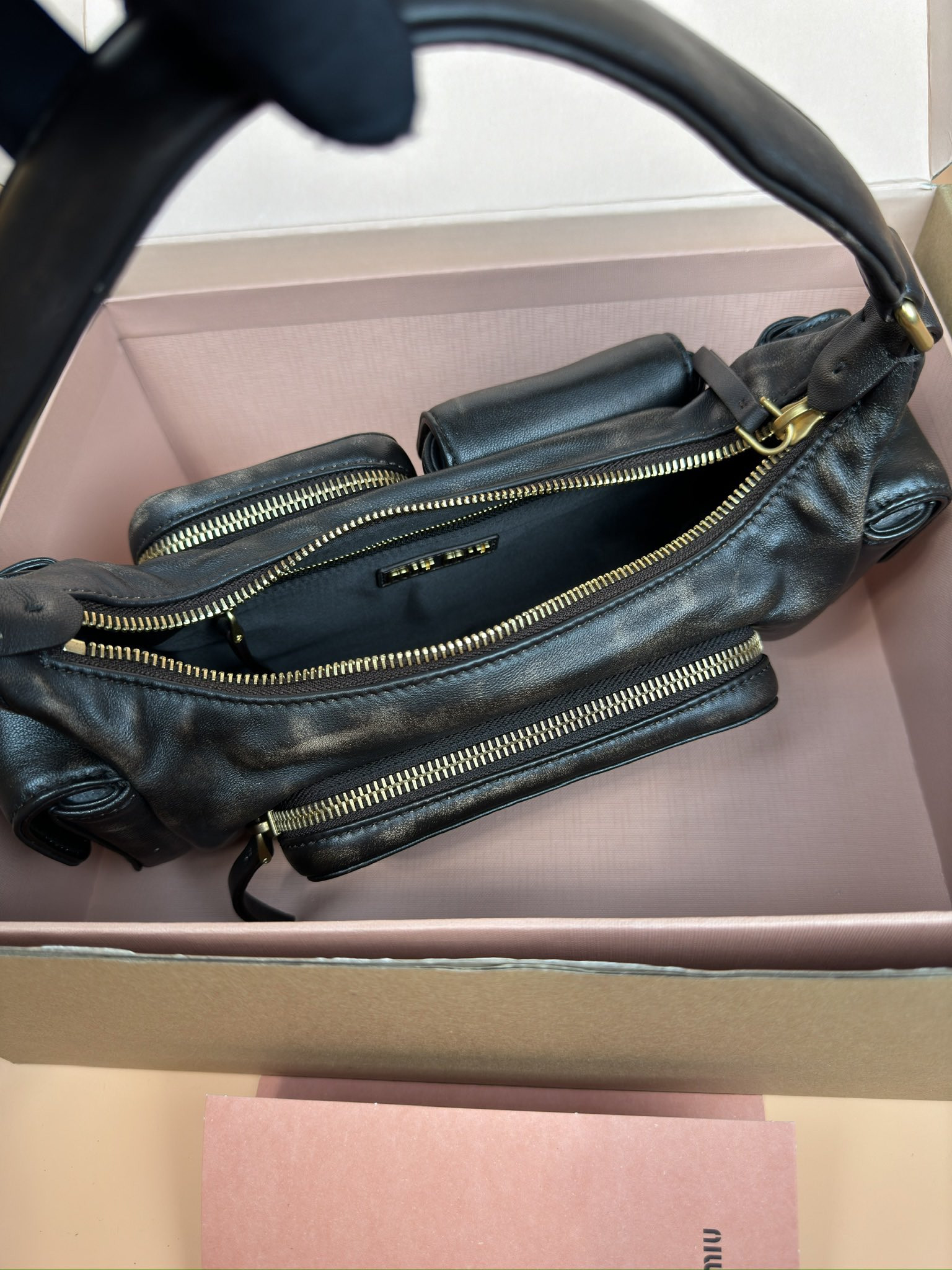 Miu Miu Hobo Nappa leather pocket bag 12x21x6cm